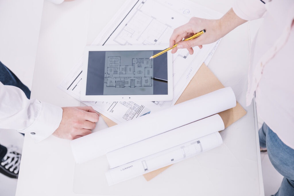 Key Capability Areas Every Construction Professional Should Develop From People Discussing Draft Tablet 1024x683